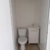 37e3c5_3bfb128a149b4247885a118c826f08e7mv2 Oficina con contenedor de 18 m2 y baño